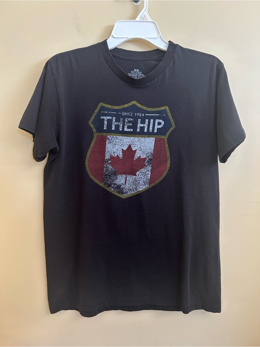 The Hip Men’s Black Graphic T‑Shirt with Maple Shield